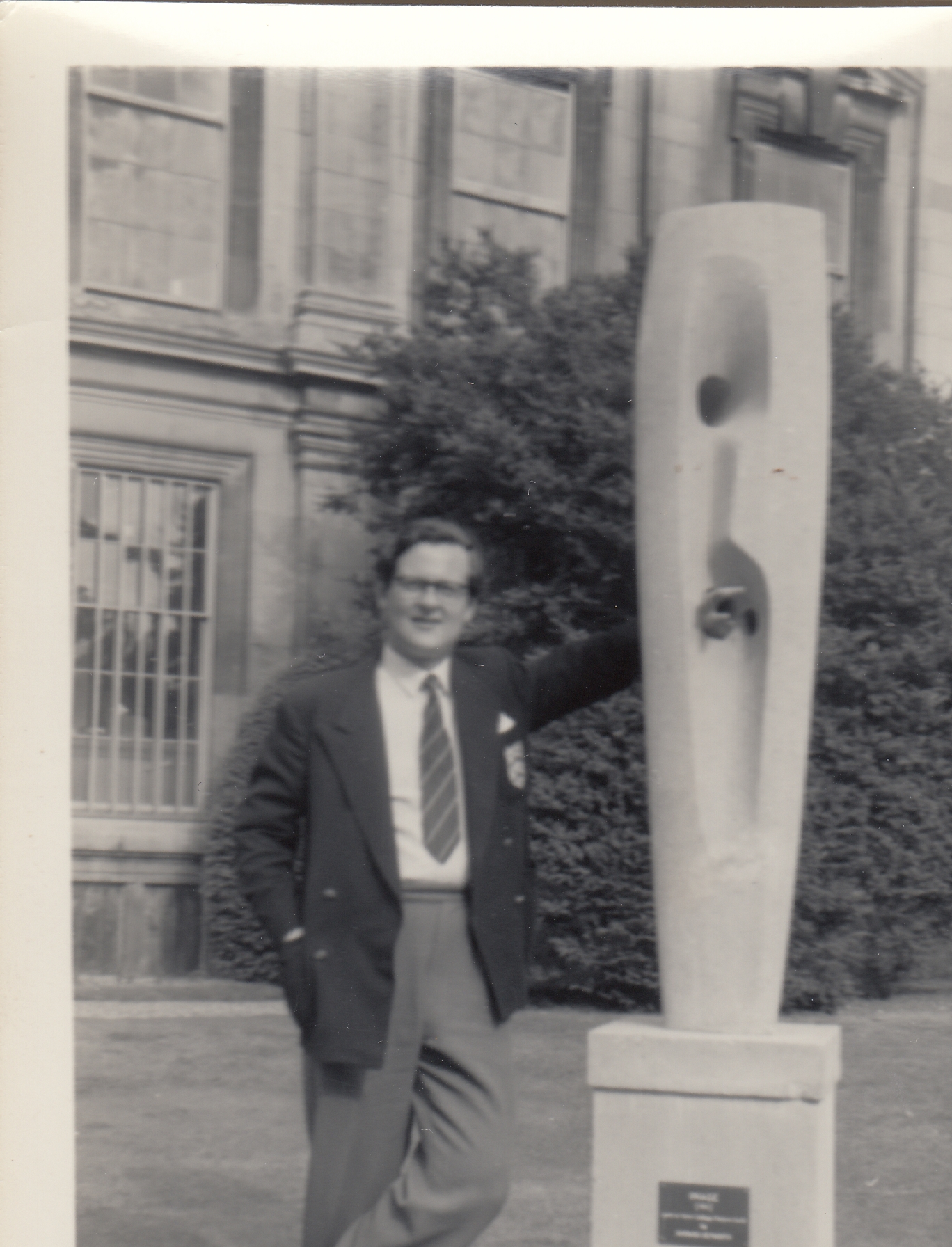 MichaelWithStatueInClareCollegeCambridgeJune1957.jpg